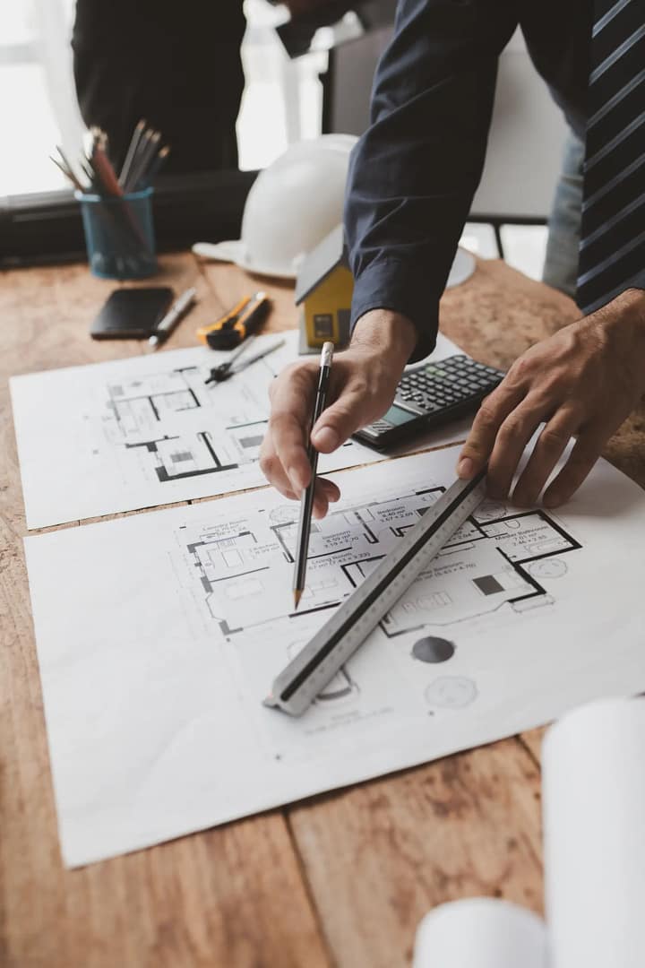 Architects design house plans for clients drawing